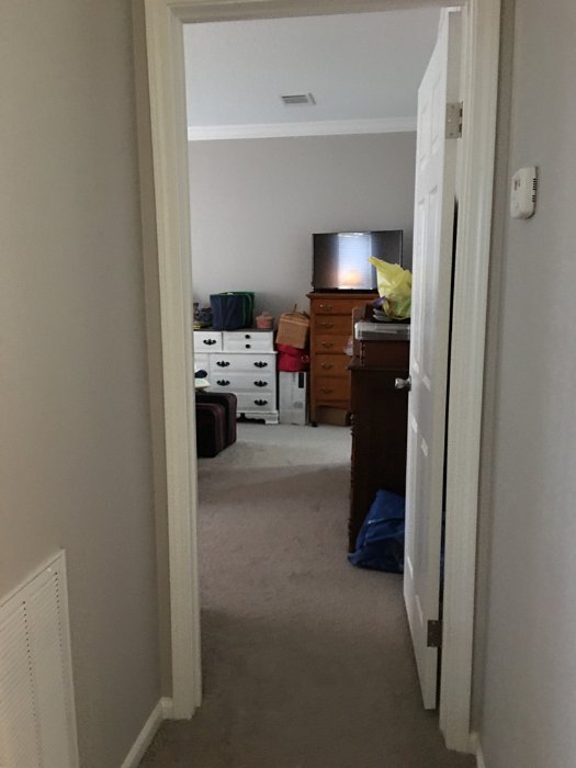 14-Hallway into master bedroom and bath from living rm.jpg